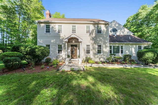 32 Echo Valley Rd, Newtown, CT 06470 - colonial-style house featuring a chimney and a front yard