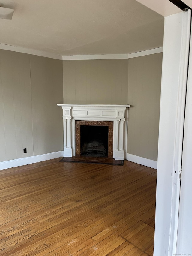 51 Griswold St, Meriden, CT 06450 - unfurnished living room featuring wood-type flooring, ornamental molding, baseboards, and a premium fireplace