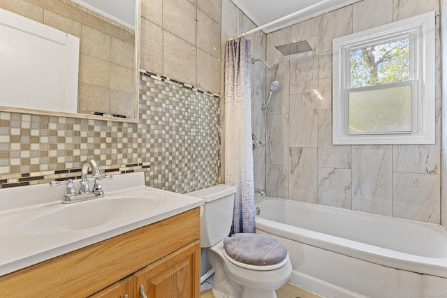81 Montague Cir E, Hartford, CT 06118 - full bathroom with tile walls, toilet, shower / bath combination with curtain, tasteful backsplash, and vanity