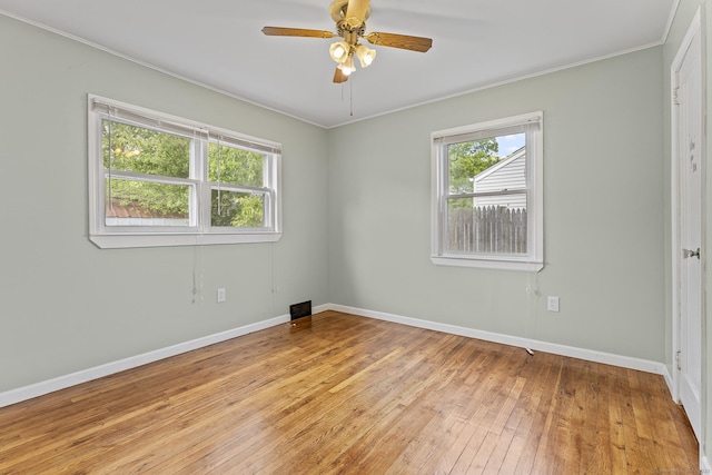 81 Montague Cir E, Hartford, CT 06118 - unfurnished room featuring crown molding, light wood-style floors, baseboards, and ceiling fan