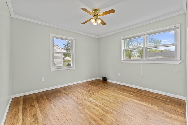 81 Montague Cir E, Hartford, CT 06118 - spare room featuring plenty of natural light, a ceiling fan, baseboards, ornamental molding, and wood-type flooring