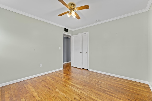 81 Montague Cir E, Hartford, CT 06118 - spare room with ceiling fan, baseboards, ornamental molding, and light wood-style flooring