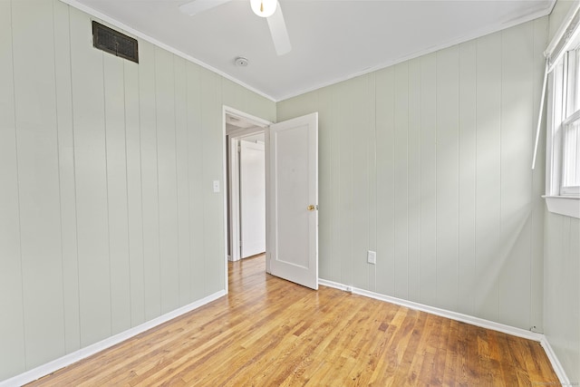 81 Montague Cir E, Hartford, CT 06118 - unfurnished room featuring light wood-style flooring, a ceiling fan, baseboards, and ornamental molding