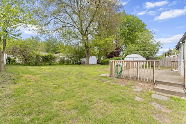 81 Montague Cir E, Hartford, CT 06118 - view of yard featuring a shed, an outbuilding, and a deck