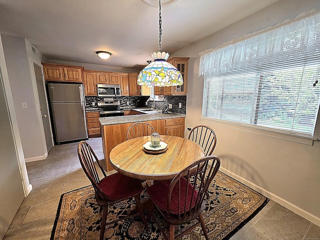 470 Heritage Vlg Unit A, Southbury, CT 06488 - dining space with baseboards and light tile patterned floors