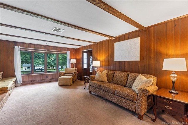 120 Peters Ln, Stratford, CT 06614 - carpeted living room with beam ceiling and wood walls