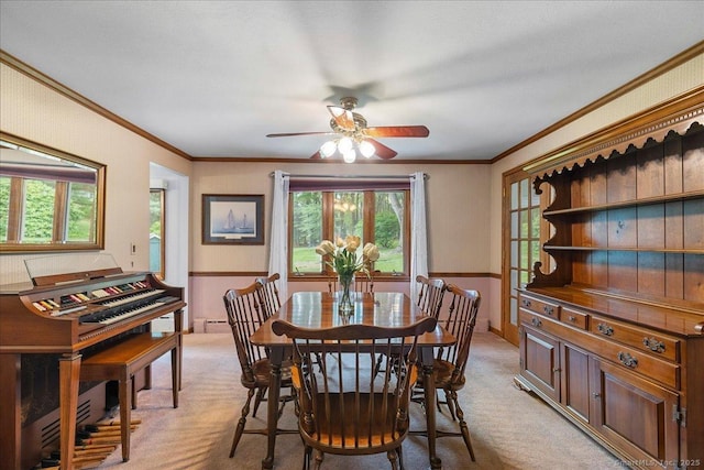 120 Peters Ln, Stratford, CT 06614 - dining space featuring light colored carpet, ceiling fan, ornamental molding, and baseboards
