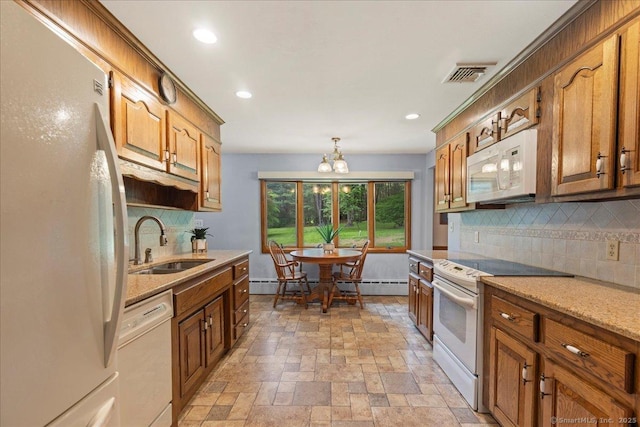 120 Peters Ln, Stratford, CT 06614 - kitchen featuring white appliances, a sink, decorative backsplash, recessed lighting, and a chandelier