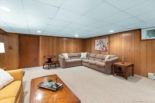 120 Peters Ln, Stratford, CT 06614 - living room with carpet, a drop ceiling, wooden walls, and recessed lighting