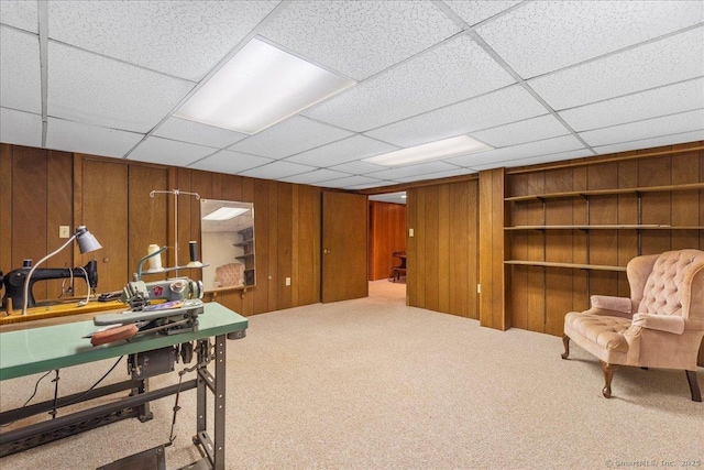 120 Peters Ln, Stratford, CT 06614 - sitting room featuring wood walls, carpet, and a drop ceiling