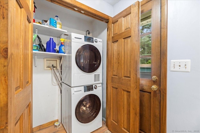 120 Peters Ln, Stratford, CT 06614 - laundry area featuring stacked washer / drying machine