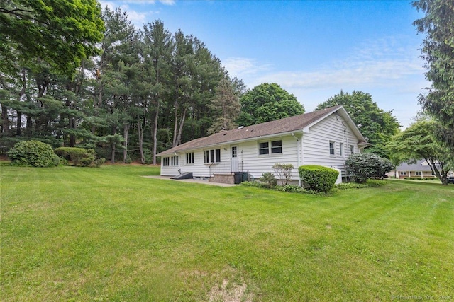 120 Peters Ln, Stratford, CT 06614 - rear view of property with a yard
