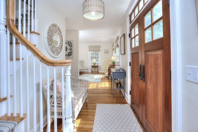 127 College Park Dr, Fairfield, CT 06824 - foyer featuring wood finished floors and stairway