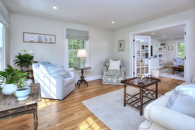 127 College Park Dr, Fairfield, CT 06824 - living room with wood finished floors, recessed lighting, and baseboards