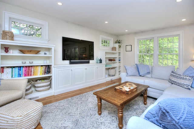 127 College Park Dr, Fairfield, CT 06824 - living room with wood finished floors and recessed lighting