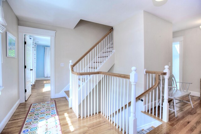 127 College Park Dr, Fairfield, CT 06824 - staircase featuring wood finished floors and baseboards