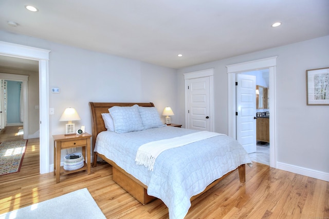 127 College Park Dr, Fairfield, CT 06824 - bedroom featuring light wood-type flooring, recessed lighting, baseboards, and connected bathroom