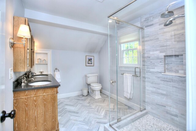 127 College Park Dr, Fairfield, CT 06824 - full bath with toilet, a shower stall, baseboards, vaulted ceiling, and double vanity