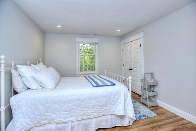127 College Park Dr, Fairfield, CT 06824 - bedroom featuring wood finished floors, baseboards, and recessed lighting