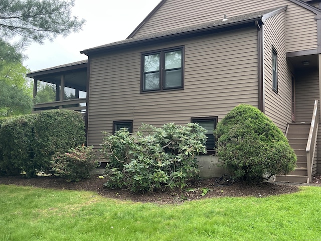 36 Overlook Dr Unit 36, Monroe, CT 06468 - view of side of home featuring stairway and a lawn