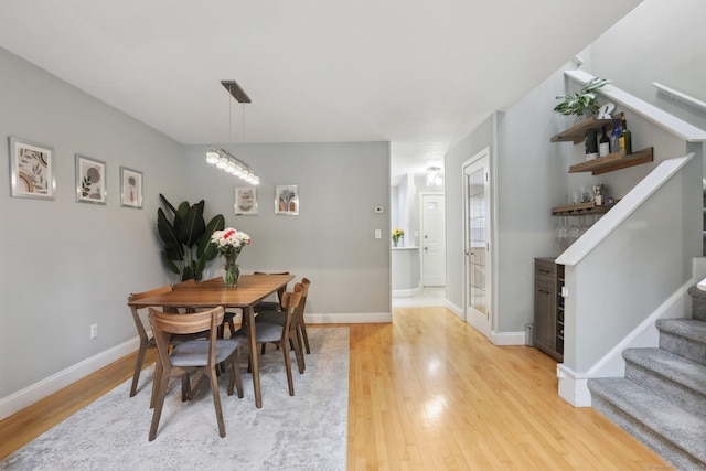36 Overlook Dr Unit 36, Monroe, CT 06468 - dining space with stairway, light wood-style floors, and baseboards
