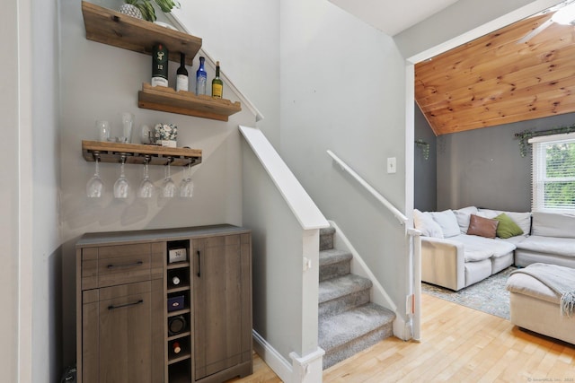 36 Overlook Dr Unit 36, Monroe, CT 06468 - indoor dry bar with light wood-style floors, vaulted ceiling, stairway, and baseboards