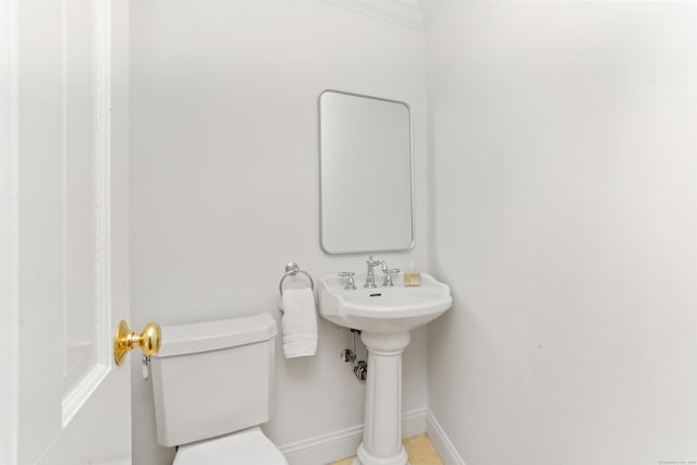 26 Heritage Ln, Weston, CT 06883 - bathroom with toilet, baseboards, and crown molding