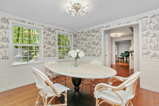 26 Heritage Ln, Weston, CT 06883 - dining area with a chandelier, wood-type flooring, wallpapered walls, wainscoting, and crown molding