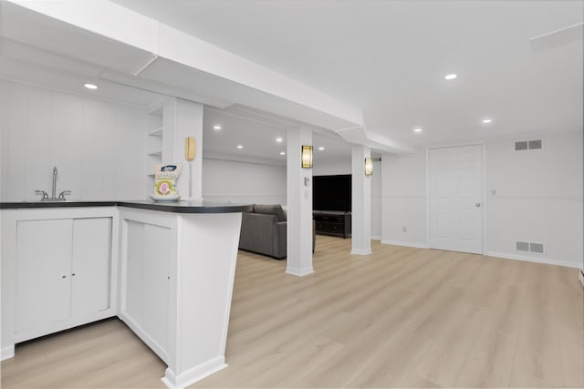 26 Heritage Ln, Weston, CT 06883 - kitchen featuring open floor plan, dark countertops, light wood finished floors, a sink, and recessed lighting