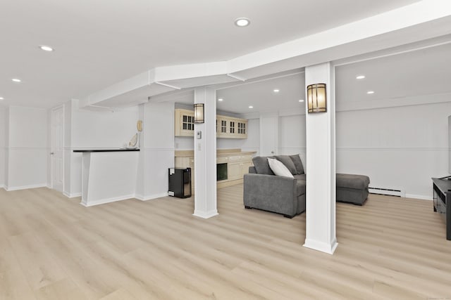 26 Heritage Ln, Weston, CT 06883 - living room featuring a baseboard radiator, light wood-type flooring, recessed lighting, and baseboards
