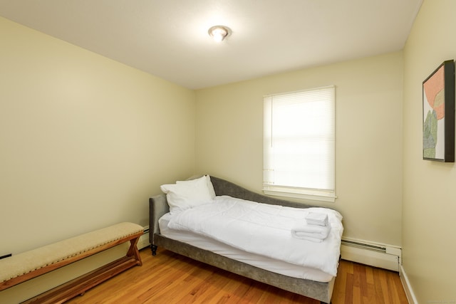 15 Haywardville Rd, East Haddam, CT 06423 - bedroom with baseboard heating, light wood finished floors, and baseboards