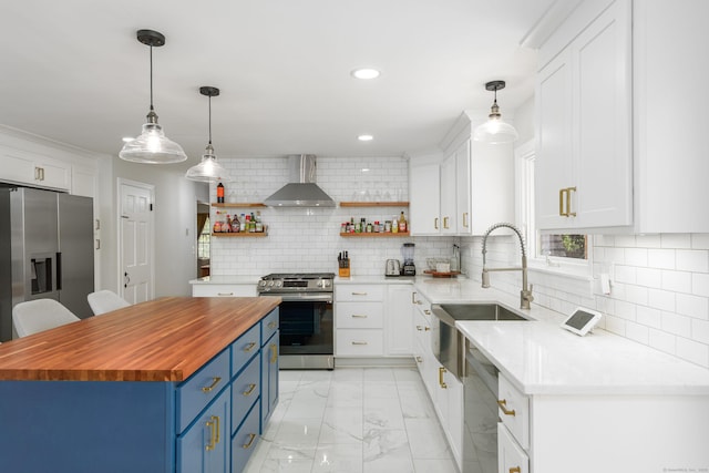 15 Haywardville Rd, East Haddam, CT 06423 - kitchen featuring wooden counters, wall chimney exhaust hood, blue cabinets, appliances with stainless steel finishes, and open shelves