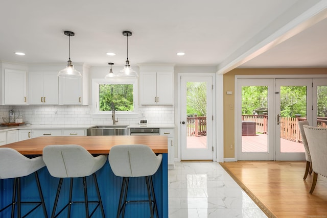 15 Haywardville Rd, East Haddam, CT 06423 - kitchen featuring wooden counters, a sink, healthy amount of natural light, white cabinets, and recessed lighting