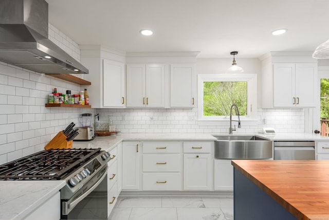 15 Haywardville Rd, East Haddam, CT 06423 - kitchen with wall chimney range hood, gas stove, wooden counters, a sink, and backsplash