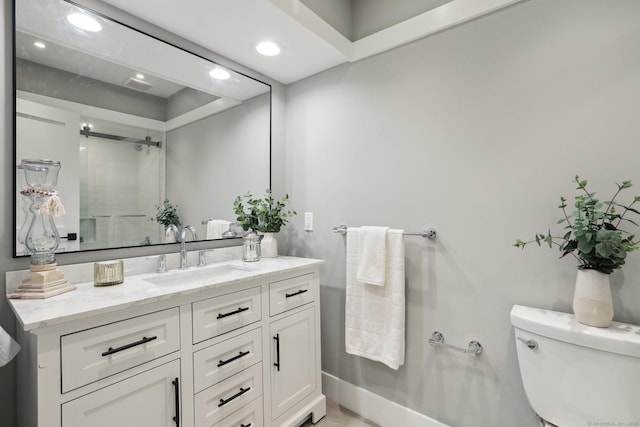 787 Heritage Vlg Unit A, Southbury, CT 06488 - full bathroom with toilet, vanity, baseboards, a shower, and recessed lighting