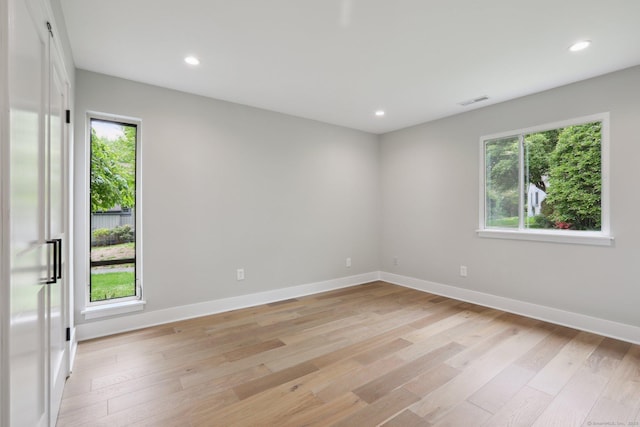 787 Heritage Vlg Unit A, Southbury, CT 06488 - empty room with light wood finished floors, recessed lighting, and baseboards