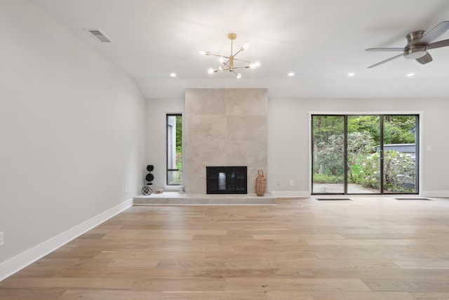 787 Heritage Vlg Unit A, Southbury, CT 06488 - unfurnished living room featuring recessed lighting, light wood-style floors, a chandelier, and baseboards