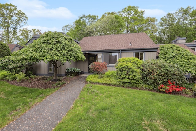 787 Heritage Vlg Unit A, Southbury, CT 06488 - view of front of house with roof with shingles and a front lawn