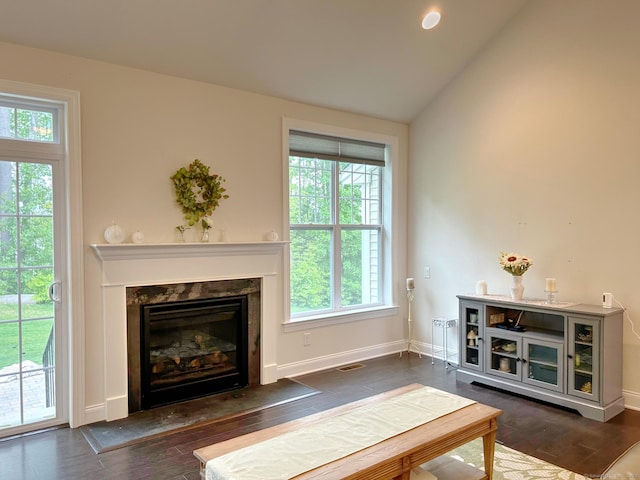 17 Highridge Rd Unit 17, Middlebury, CT 06762 - living area with wood finished floors, a fireplace, baseboards, and vaulted ceiling