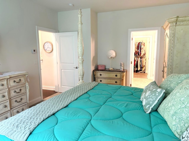 17 Highridge Rd Unit 17, Middlebury, CT 06762 - carpeted bedroom featuring a spacious closet, baseboards, and a closet