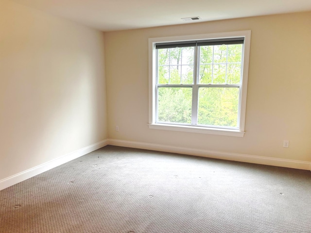 17 Highridge Rd Unit 17, Middlebury, CT 06762 - spare room featuring healthy amount of natural light, carpet floors, and baseboards