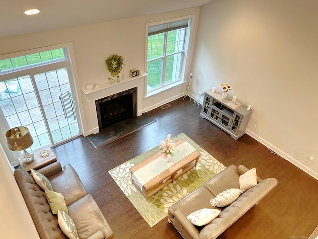 17 Highridge Rd Unit 17, Middlebury, CT 06762 - living room with a premium fireplace, baseboards, wood finished floors, and recessed lighting
