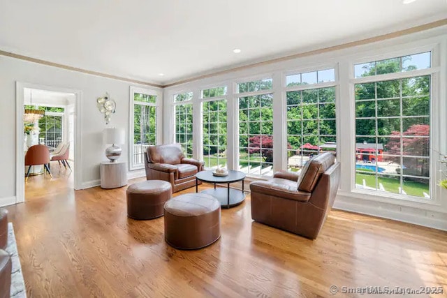 122 Mirey Dam Rd, Middlebury, CT 06762 - sunroom featuring french doors, baseboards, wood finished floors, and crown molding