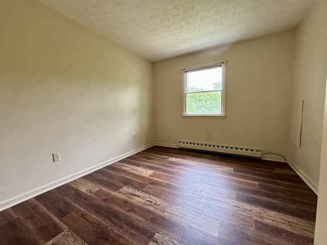 unfurnished room with a baseboard radiator, a textured ceiling, dark wood-type flooring, and baseboards