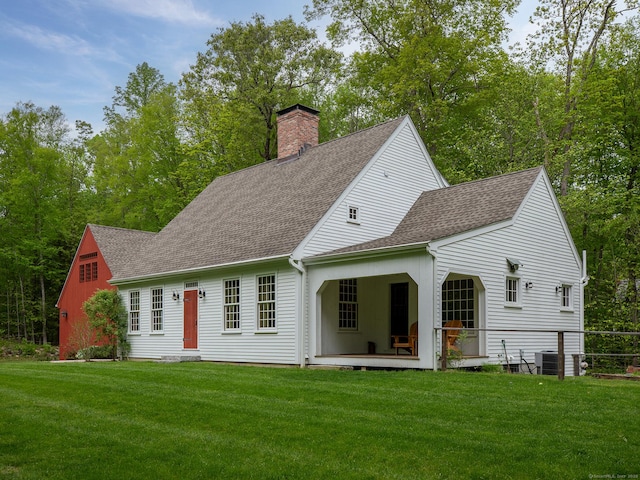 332 Good Hill Rd, Woodbury, CT 06798 - rear view of property with roof with shingles, a chimney, a yard, and central AC