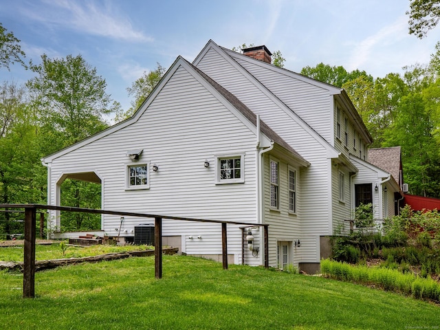 332 Good Hill Rd, Woodbury, CT 06798 - view of property exterior with a yard, a chimney, and central air condition unit