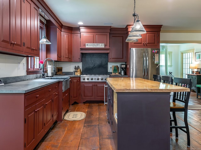 332 Good Hill Rd, Woodbury, CT 06798 - kitchen with stainless steel appliances, a kitchen bar, pendant lighting, dark wood finished floors, and a sink