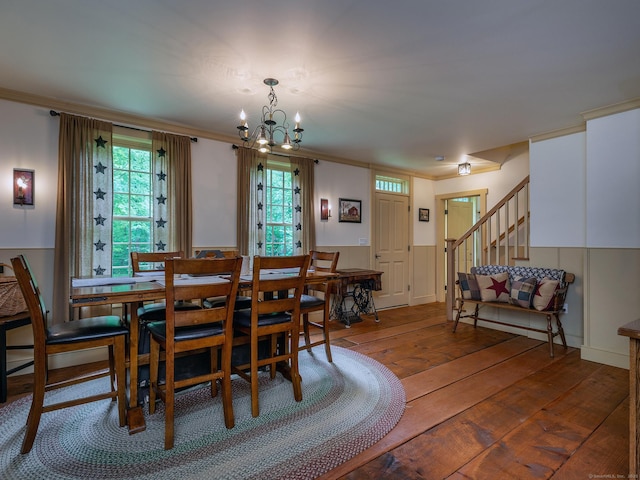 332 Good Hill Rd, Woodbury, CT 06798 - dining area with hardwood / wood-style floors, a chandelier, ornamental molding, healthy amount of natural light, and stairway