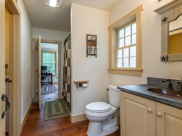 332 Good Hill Rd, Woodbury, CT 06798 - full bathroom featuring wood finished floors, toilet, vanity, and baseboards