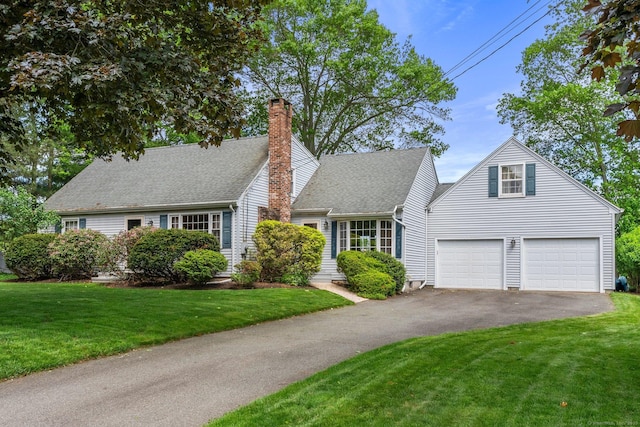 19 Edgewood St, Cromwell, CT 06416 - cape cod house with asphalt driveway, a chimney, a front yard, and a garage